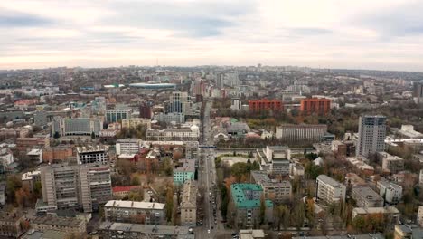 Flying-over-downtown-buildings.-Drone's-eye-view-of-street-in-city.