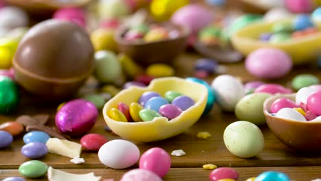 chocolate-easter-eggs-and-drop-candies-on-table