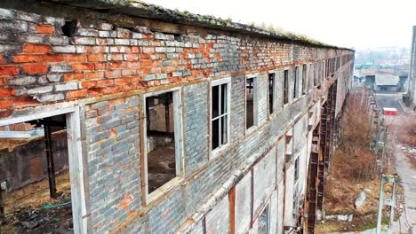 Aerial-view-of-an-old-factory-ruin-and-broken-windows.