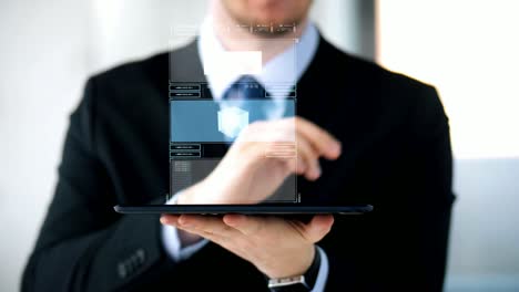 businessman-with-virtual-projection-over-tablet-pc