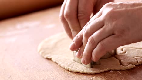 Easter-cakes-making,-cutting-bunnies-using-bunny-cutter,-close-up