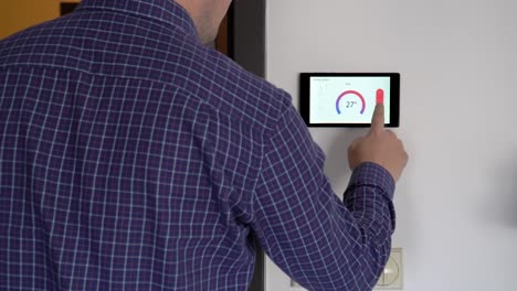 Smart-home-climate-control-device-on-a-wall