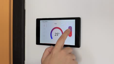 Smart-home-climate-control-device-on-a-wall