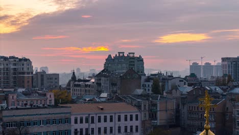 Aerial-view-of-Kyiv-city-at-sunset,-Ukraine.-Panoramic-cityscape,-4k-time-lapse