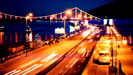 Nightlife-in-Kiev.-A-view-of-the-Dnieper-River-and-the-embankment.-Night-traffic-time-lapse.