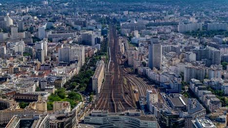 Top-view-of-Paris-skyline-from-observation-deck-of-Montparnasse-tower-timelapse.-Main-landmarks-of-european-megapolis.-Paris,-France