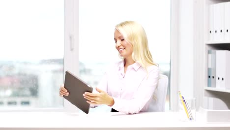 businesswoman-or-student-with-tablet-pc-computer-at-office