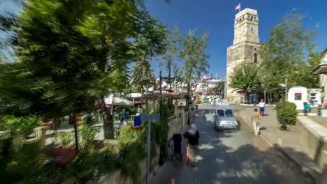 Walk-through-the-tourist-market-with-wide-range-of-sunglasses,-magnets,-arabian-lamps-and-other-souvenirs-timelapse-hyperlapse-in-Antalya