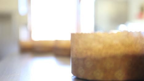 pastry-easter-sweet-bread-cakes-on-worktop,-panning-close-up