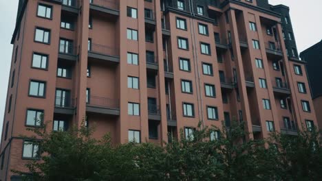 Establishing-shot-of-modern-apartment-building.-Multistoried-modern-architecture-and-stylish-living-block-of-flats