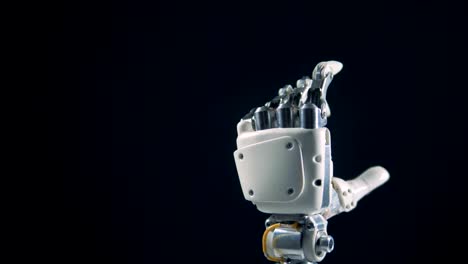 Eine-Person-macht-eine-Roboterhand,-die-seine-Finger-bewegen