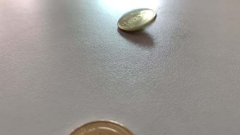 Coins-in-falling-in-slow-motion.