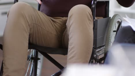 Mature-Man-Sitting-in-Wheelchair-Talking