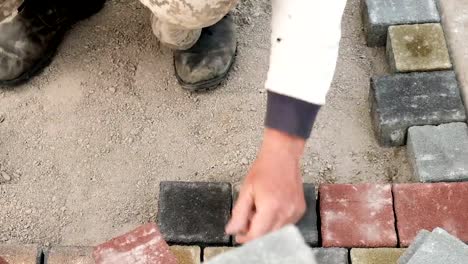 Laying-Paving-Slabs-By-Mosaic-Close-Up.-Road-Paving,-Construction.