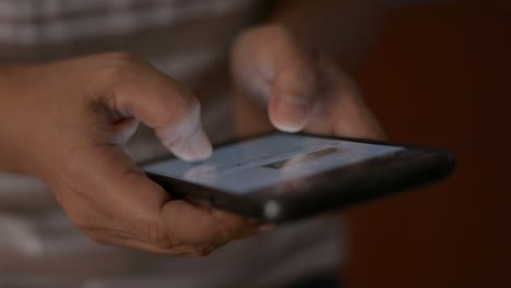 Close-up-woman-hands-texting-message-on-mobile-smart-phone-for-communication.