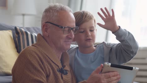 Granddad-Having-Fun-with-Grandson