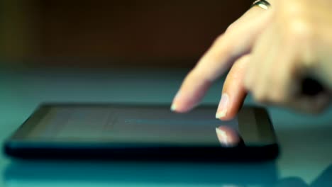 Close-up-of-a-hands-of-a-young-girl-writes-a-letter-by-e-mail-on-the-tablet.-4K.