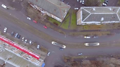 flying-over-the-roofs-of-houses-over-the-road