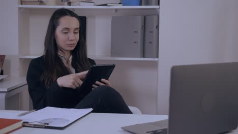 attractive-woman-resting-in-office