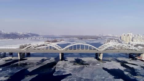 Aerial-view-of-the-Kiev-city,-Ukraine.-Dnieper-river-with-bridges.-Darnitskiy-bridge