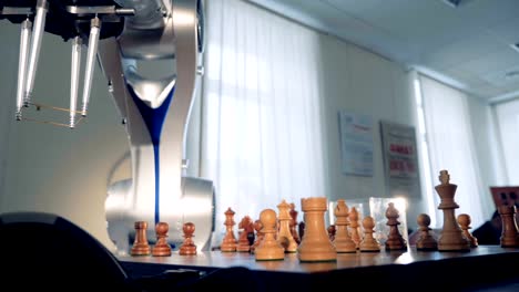 Artificial-intelligence,-machine-intelligence-concept.-Innovative-robot-playing-chess.