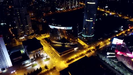 Fantastic-nighttime-skyline-with-illuminated-skyscrapers.-Video.-View-of-downtown.-Colourful-travel-background