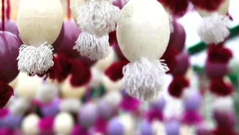 Easter-wooden-garland-with-painted-eggs.