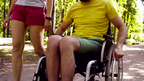 Portrait-of-happy-young-disable-man-on-a-walk-in-the-park