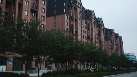 Establishing-shot-of-modern-apartment-building.-Multistoried-modern-architecture-and-stylish-living-block-of-flats