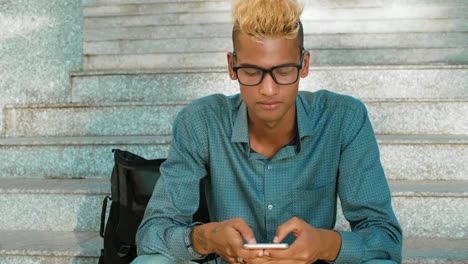 Indian-Student-Sitting-on-Stairs