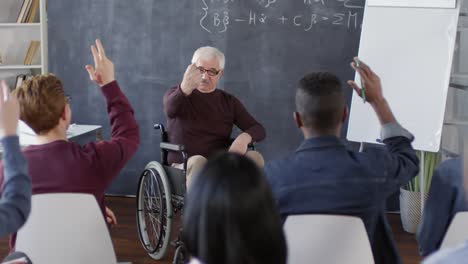 Students-Raising-Hands-to-Answer-Question