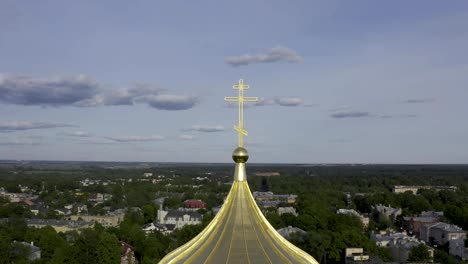 Aerial-view-of-the-Orthodox-church,-cathedral-with-golden-crosses-and-domes-in-the-city-of-Pushkin