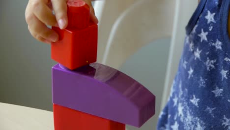 autistic-child-collects-constructor_closeup