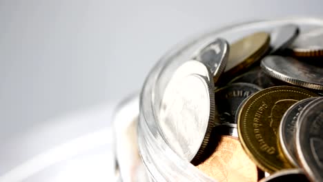 save-money-for-investment-concept-thai-coins-in-a-glass-jar