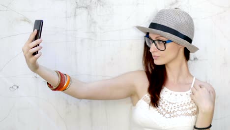 Trendy-influencer-woman-taking-selfie-with-phone