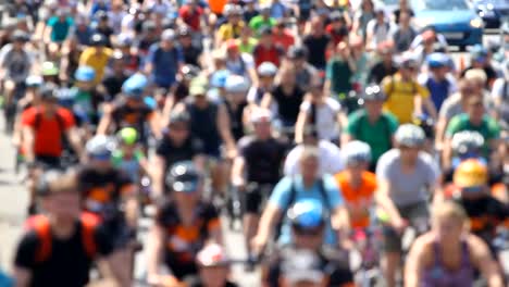 Group-of-cyclists-riding-on-the-road