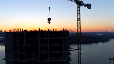 Building-under-construction-with-workers