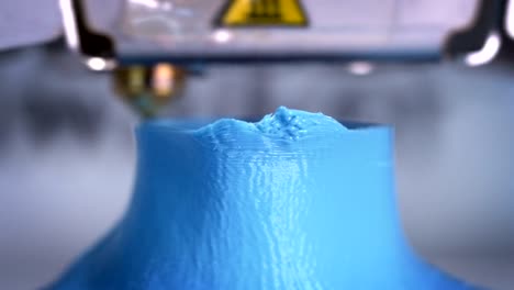 Print-head-of-3D-Printer,-extreme-Close-Up-of-Nozzle-during-printing-process