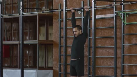 Man-with-Prosthetic-Leg-Doing-Pull-Ups-in-Gym