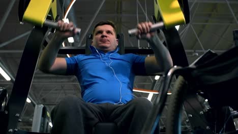 Handicapped-Man-Training-on-Chest-Press-Machine