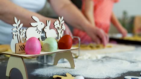 Little-Girl-and-Grandma-Cutting-Easter-Cookies