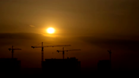 The-beautiful-sundown-above-the-city.-time-lapse