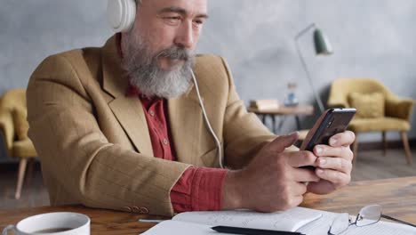 Handsome-Senior-Man-Using-Telephone