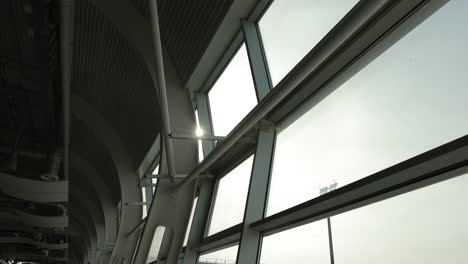 Closeup-of-metallic-architectural-constructions-at-airport-inside-terminal.