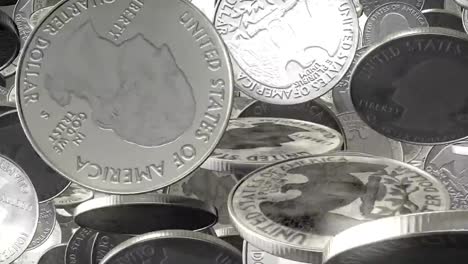 Rotating-qurter-dollar-coins-flying-toward-the-camera