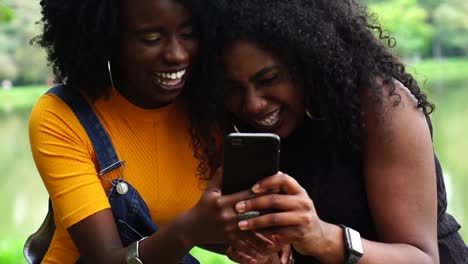 Teenager-Girls-Using-Mobile-Phone