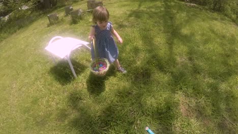 POV-of-a-mother-following-her-young-daughter-on-an-Easter-egg-hunt