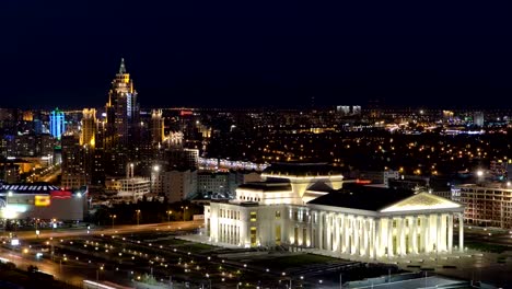 Teatro-Ópera-y-ballet-estatal-con-timelapse-de-edificio-residencial.-Astana,-Kazajstán