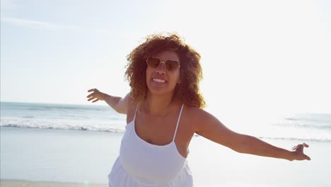 Portrait-of-African-American-female-wearing-heart-sunglasses