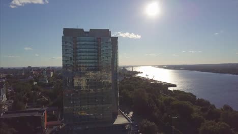 Aerial-view-of-River-and-modern-building.-Clip.-Beautiful-cityscape-at-the-sunset